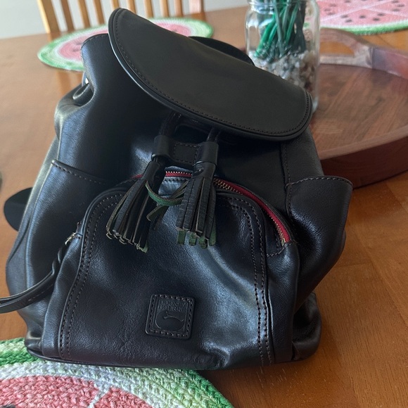 Black Leather Dooney and Bourke Backpack with Tassel - Picture 1 of 6